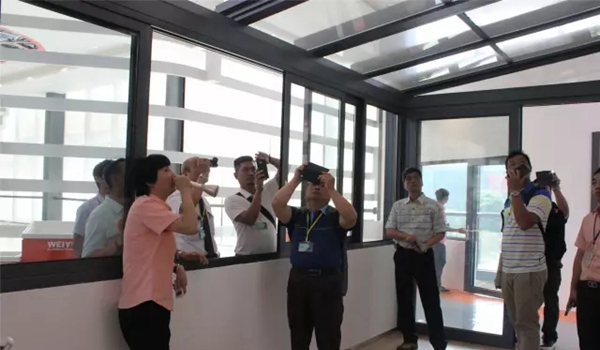 伟业迎来台湾铝门窗参访团 跨越海峡两岸共话铝建筑产业链新发展