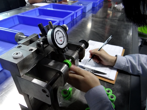 欧派克智动门新品“磁悬浮滑轮“惊艳亮相第五届中国木门技术大会