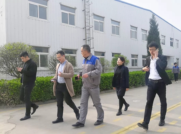 居然之家考察团莅临孟氏木门总部参观调研