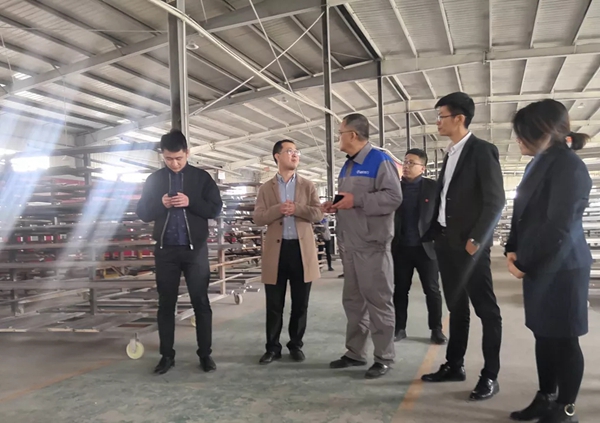 居然之家考察团莅临孟氏木门总部参观调研