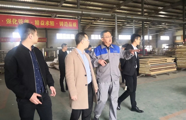 居然之家考察团莅临孟氏木门总部参观调研