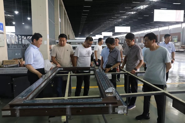 科饶恩系统门窗迎来安阳市建设科技协会、门窗幕墙专业委员会参访团参观考察