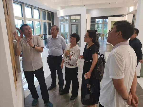 森鹰铝包木门窗迎接中国被动式建筑联盟轮值主席一行考察交流