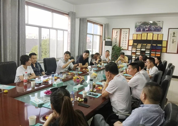开洋木门喜迎星杰装饰高管团队莅临参观考察
