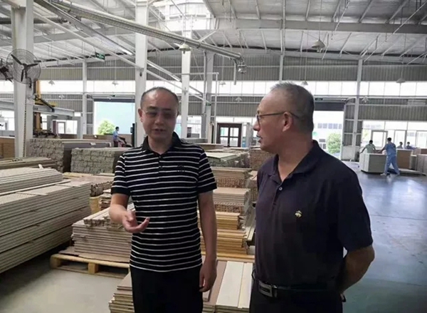 中国木材与木制品协会领导莅临千川木门考察调研