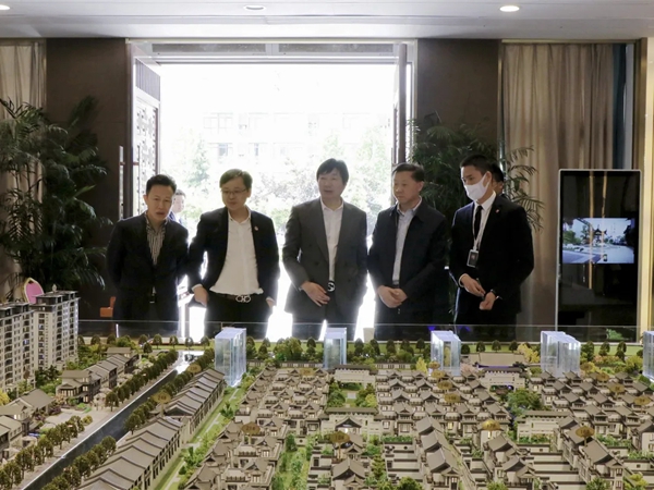 金鹏阳光门窗迎安粮集团领导一行莅临考察交流