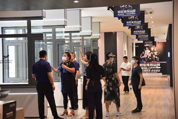 其邦门窗总部助力番禺专卖店黄埔区两个高端小区团购项目落地