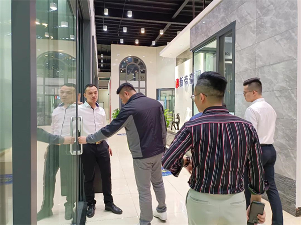 新帝豪门窗｜热烈欢迎北京WE国际建筑设计中心、十间坊考察团莅临参观交流！