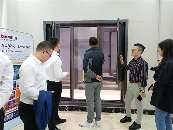新帝豪门窗｜热烈欢迎北京WE国际建筑设计中心、十间坊考察团莅临参观交流！