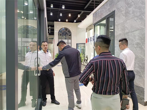 新帝豪门窗｜热烈欢迎北京WE国际建筑设计中心、十间坊考察团莅临参观交流！