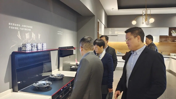 万事兴集成灶开展稳外资促消费专项调研活动，浙江省商务厅一行莅临调研
