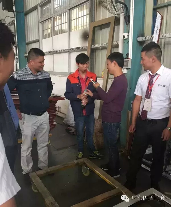 顶固集团荣高公司飞宇门窗莅临伊盾门窗参观指导